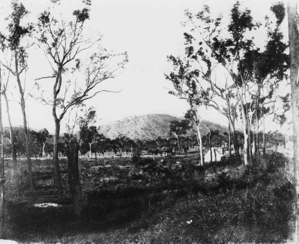 Mount Davenport with tents in the foreground at Cape River gold field